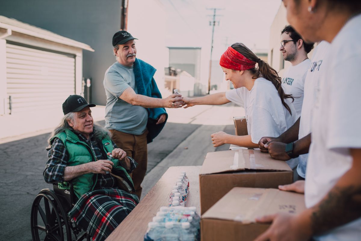 Volunteers handing out donations